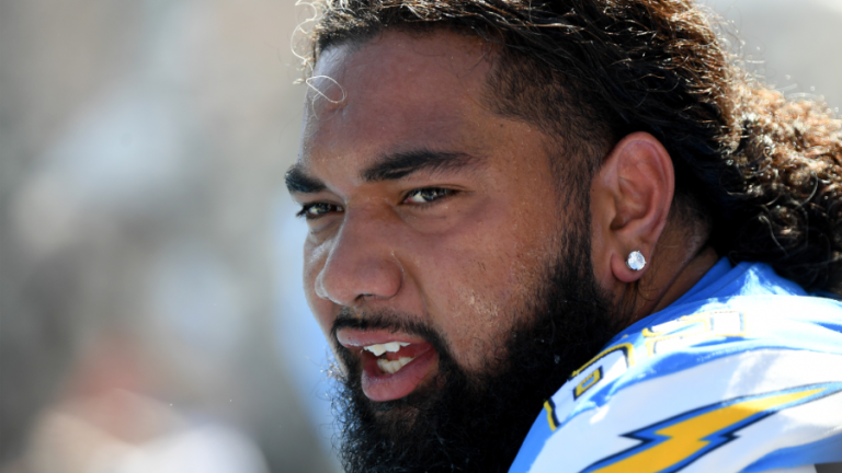 Bronson Kaufusi baptizes his Green Bay Packers teammate